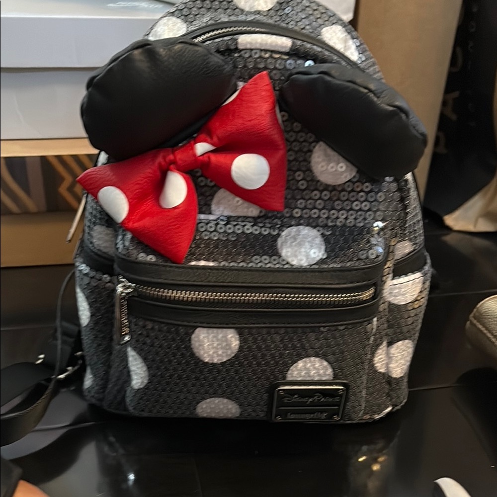 **SOLD**
Disney Loungefly Polka Dot Minnie Backpack